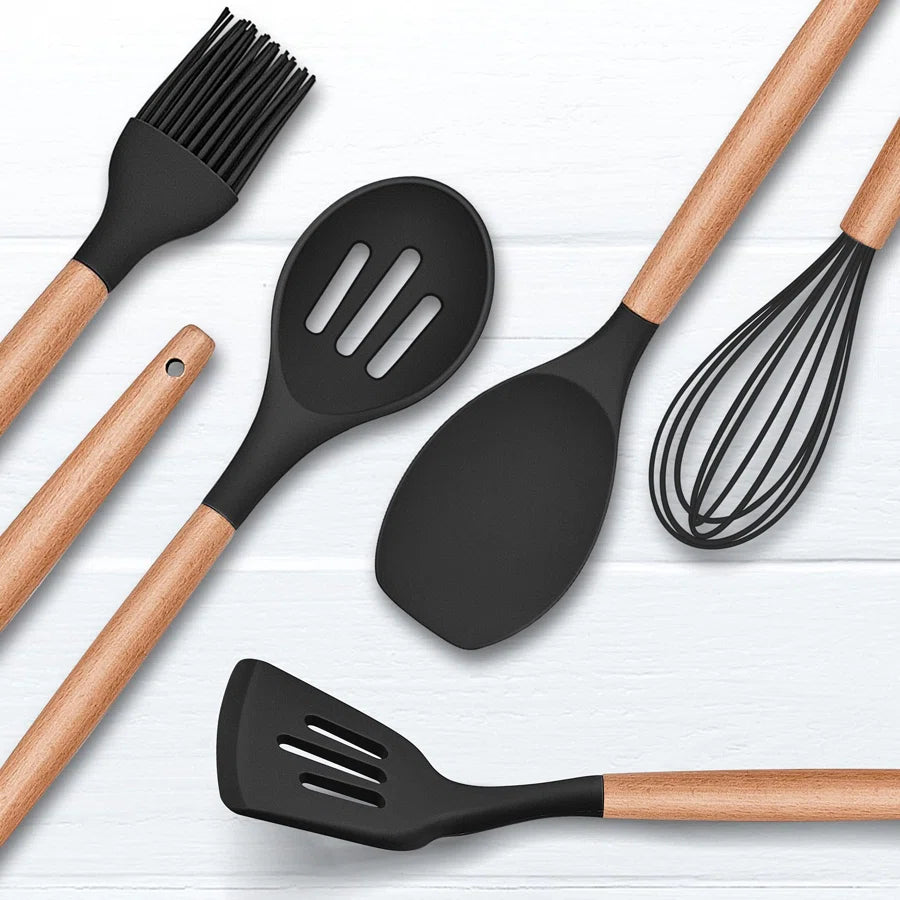 http://readysetkitchen.shop/cdn/shop/collections/12_Piece_Silicone_Utensil_With_Holder_Heat_Resistant_Cooking_Utensils_With_Wooden_Handle_For_Non_Stick_Cookware_Pans_Black.webp?v=1698258689